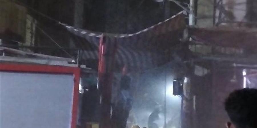 انتشال جثمان سيدة خمسينية من أسفل أنقاض عقار المنيا المنهار