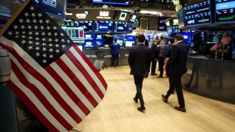 الأسهم الأمريكية تغلق على ارتفاع إثر قرار الفيدرالي