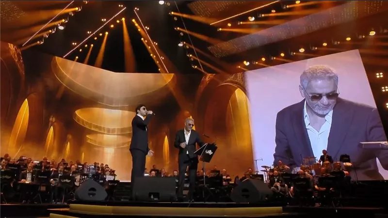 محمد فضل شاكر يشارك والده فى أولى حفلاته بعد غياب 14 عاما (صور)